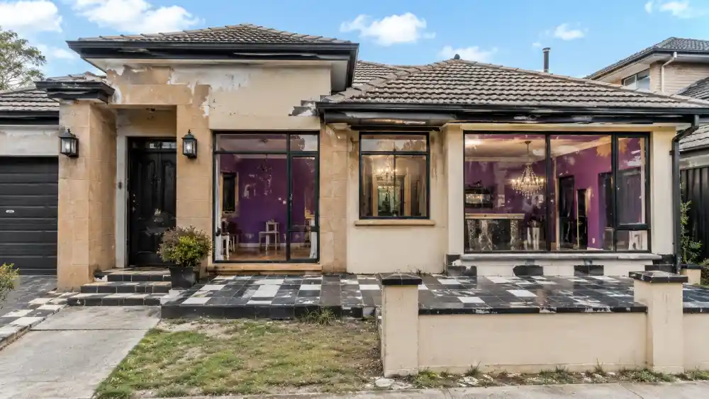 poorly renovated suburban family home with mismatched luxury fixtures